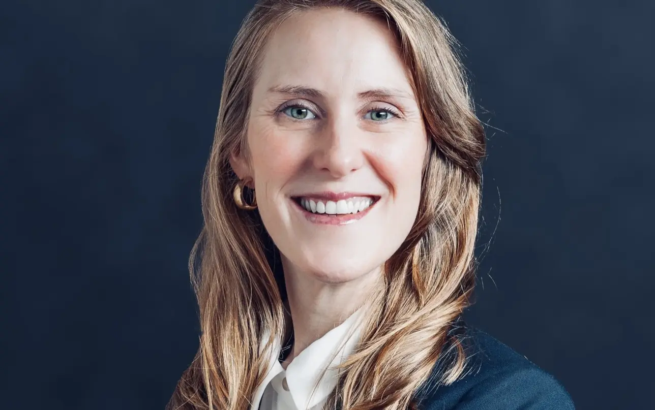 Professional headshot portrait with clean studio lighting